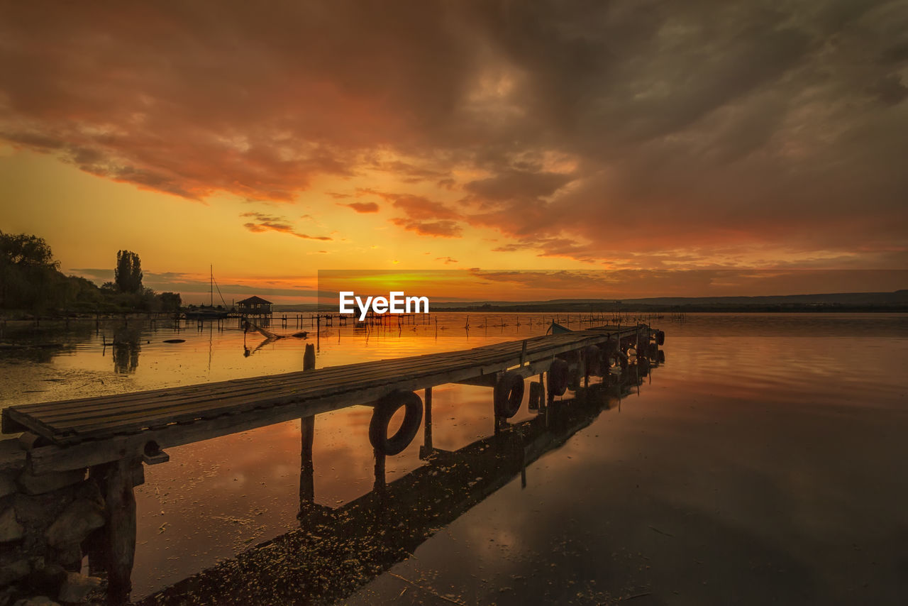 SCENIC VIEW OF SEA DURING SUNSET