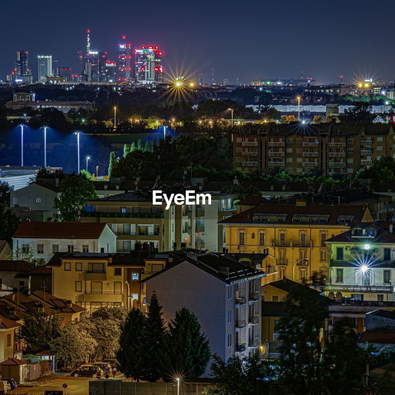 High angle view of illuminated buildings at night