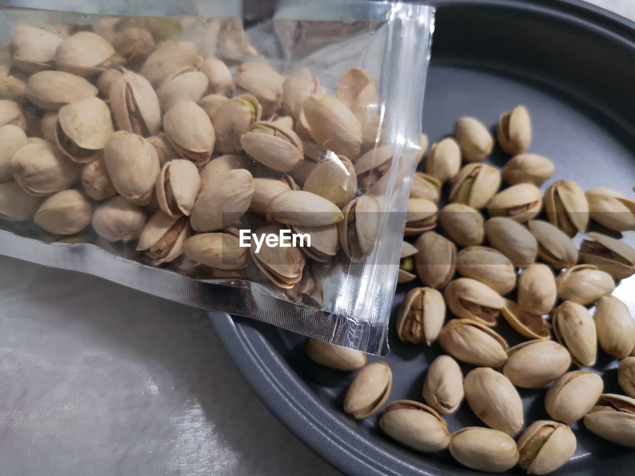 HIGH ANGLE VIEW OF CANDIES IN CONTAINER