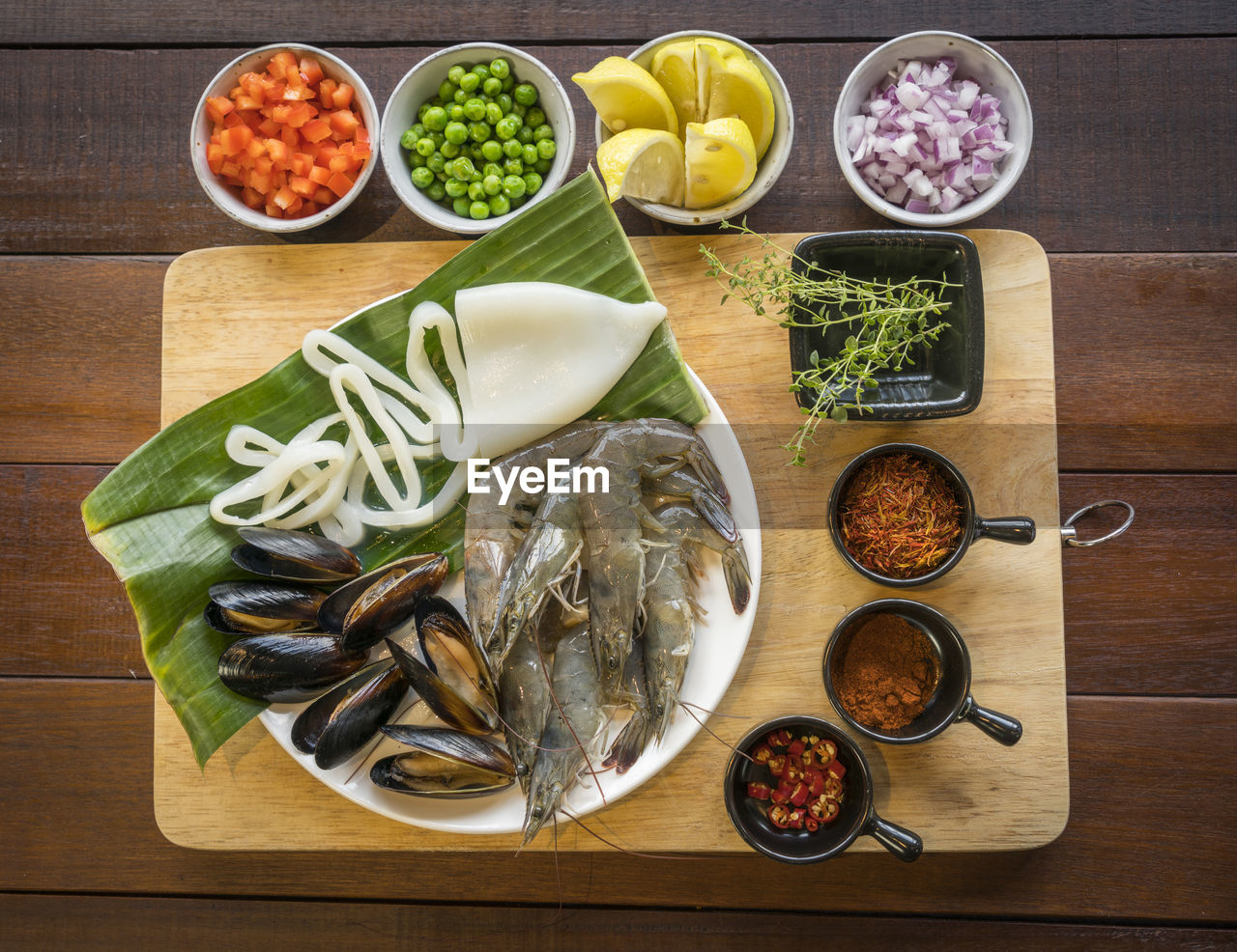 Directly above shot of food on wooden table in kitchen