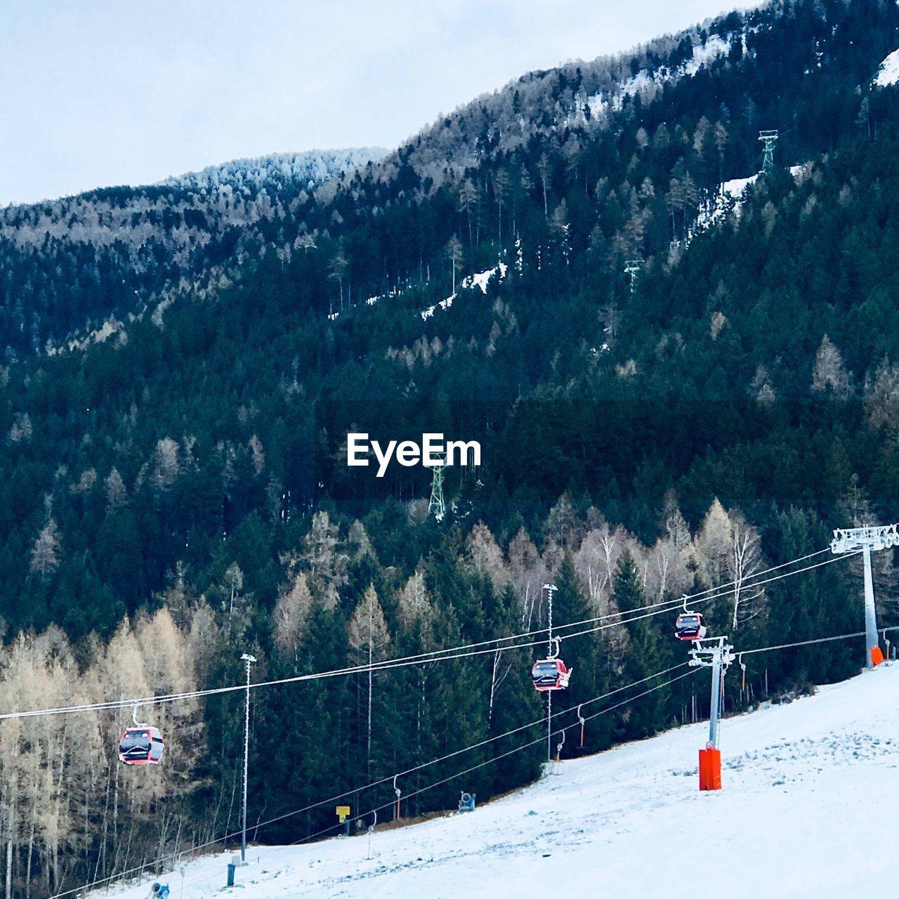 VIEW OF SKI LIFT OVER MOUNTAINS