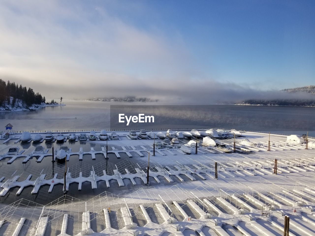 Scenic view of frozen lake against sky