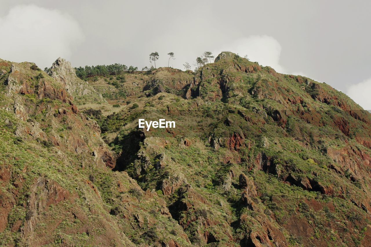 Low angle view of mountain against sky