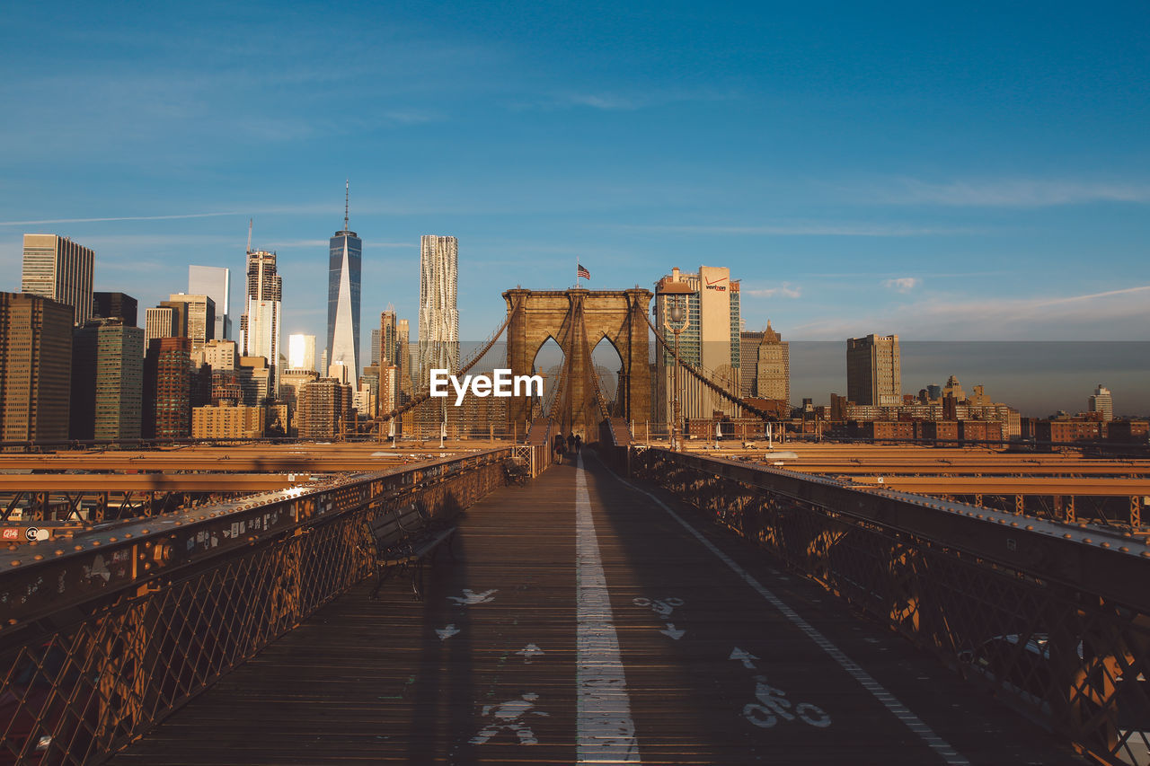 Brooklyn bridge and cityscape against sky