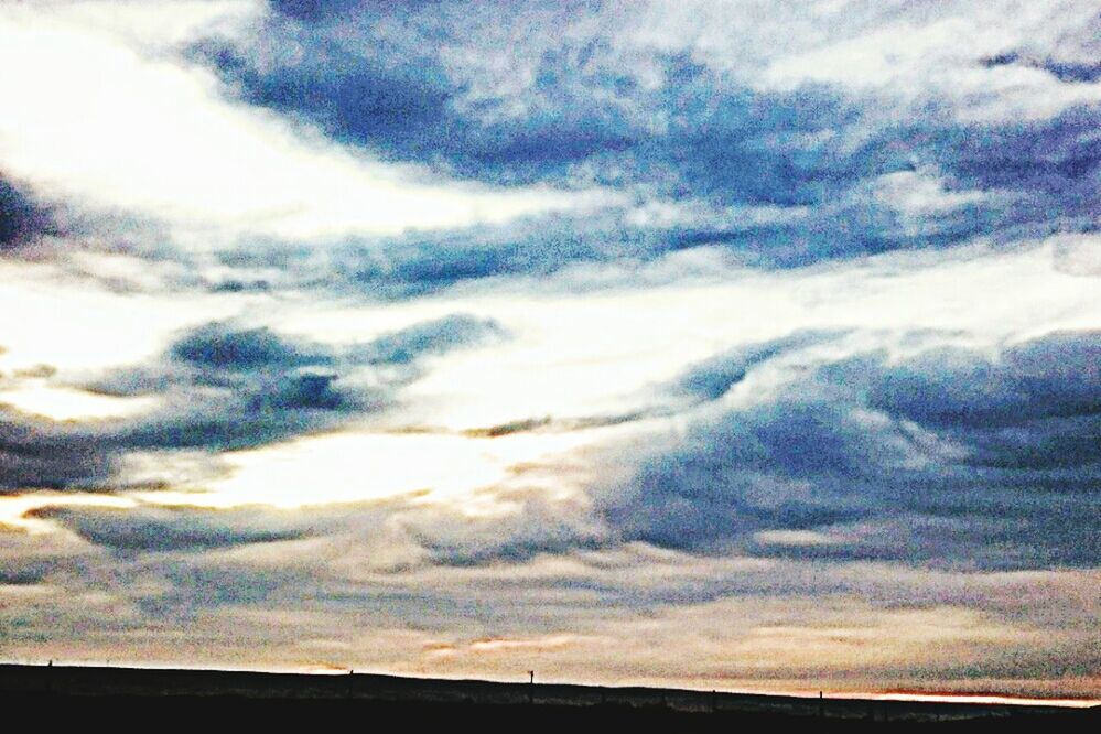 SCENIC VIEW OF LANDSCAPE AGAINST DRAMATIC SKY