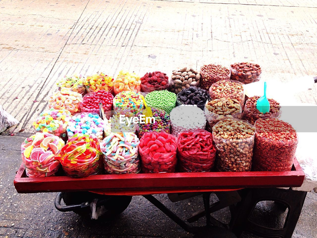 Elevated view of sweets on hand cart