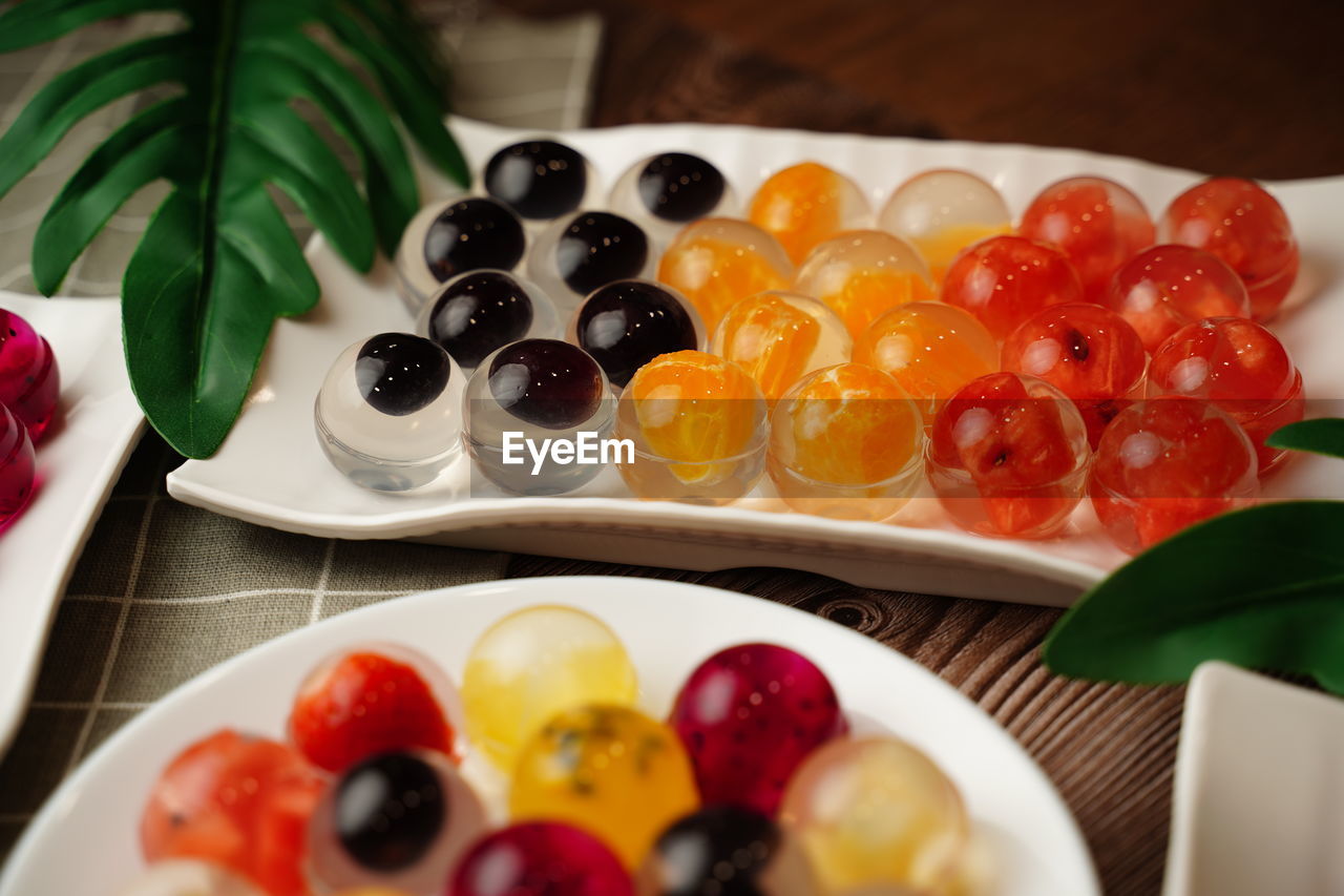 Fruit jelly agar agar fruit cake healthy vegan. dragon fruit passion fruit strawberry grape