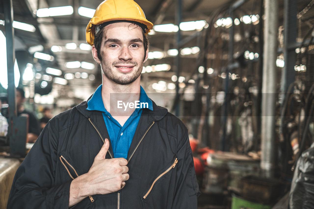 PORTRAIT OF A MAN WORKING OUTDOORS