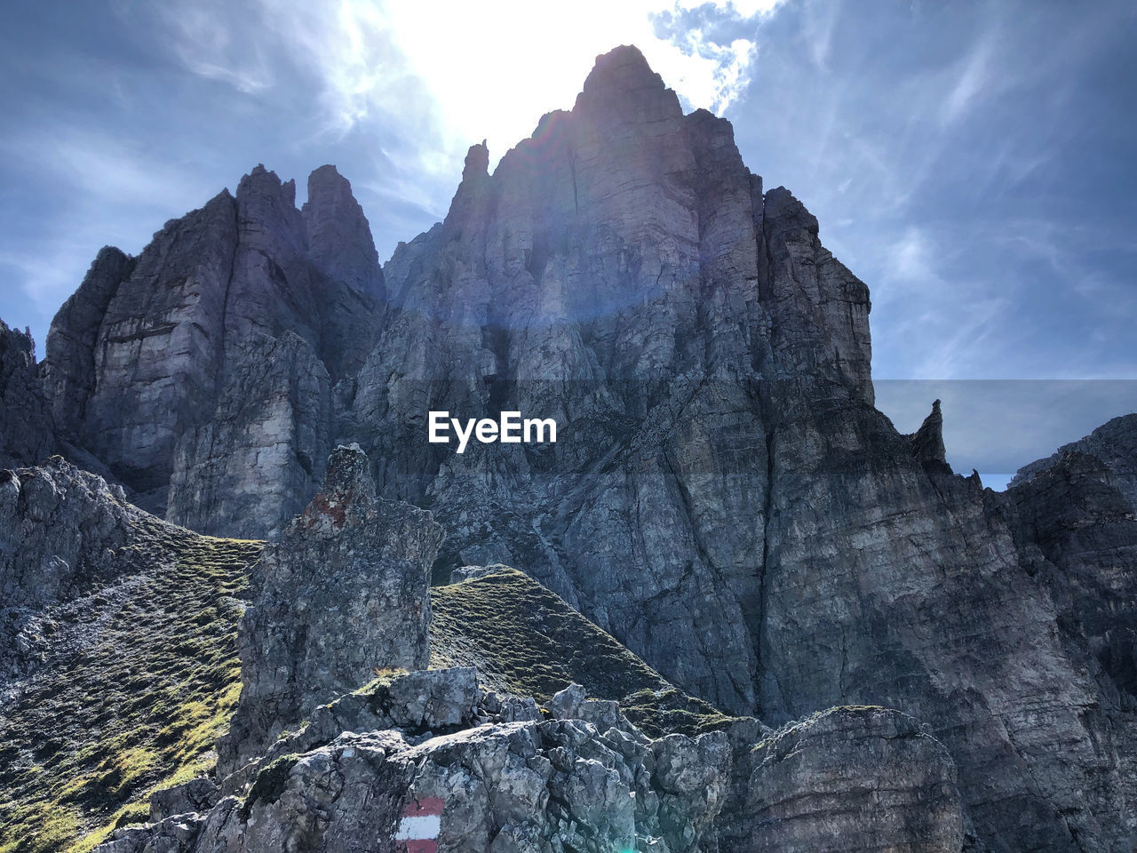 Low angle view of rock mountains against sky