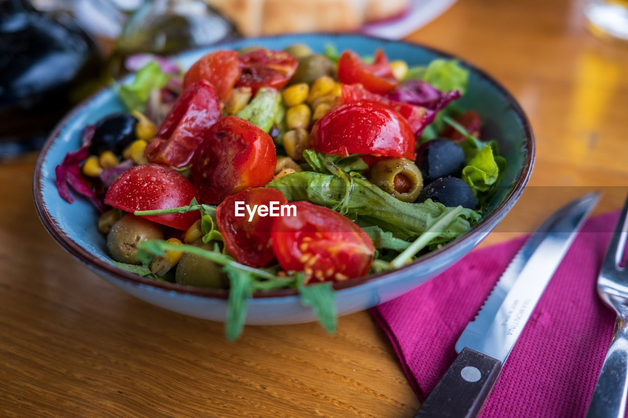 high angle view of salad in bowl on table