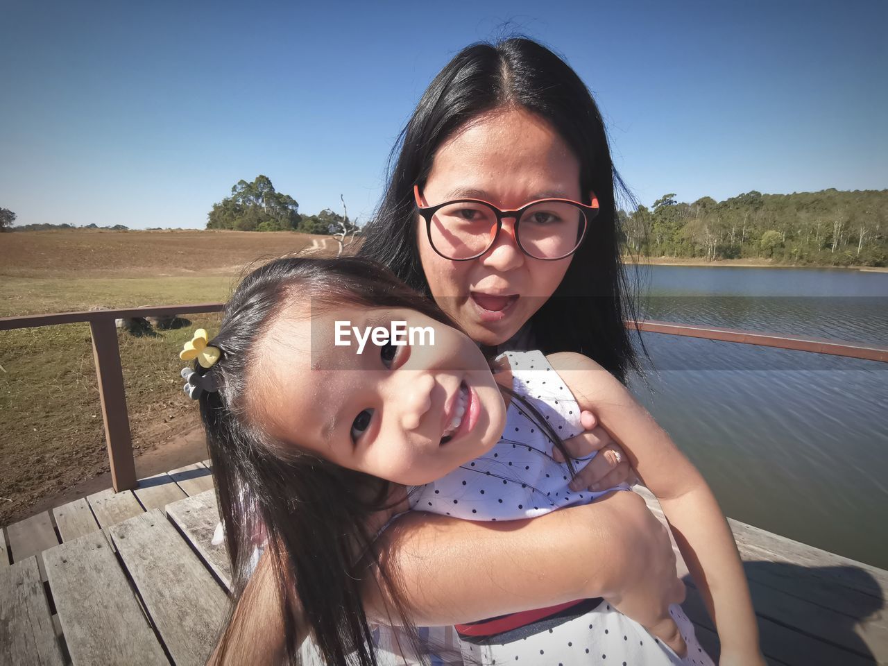 Portrait of happy mother and daughter