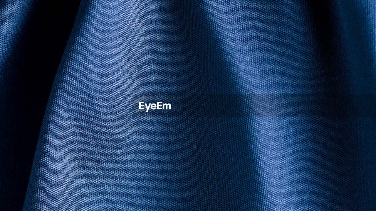 FULL FRAME SHOT OF BLUE ILLUMINATED DARK