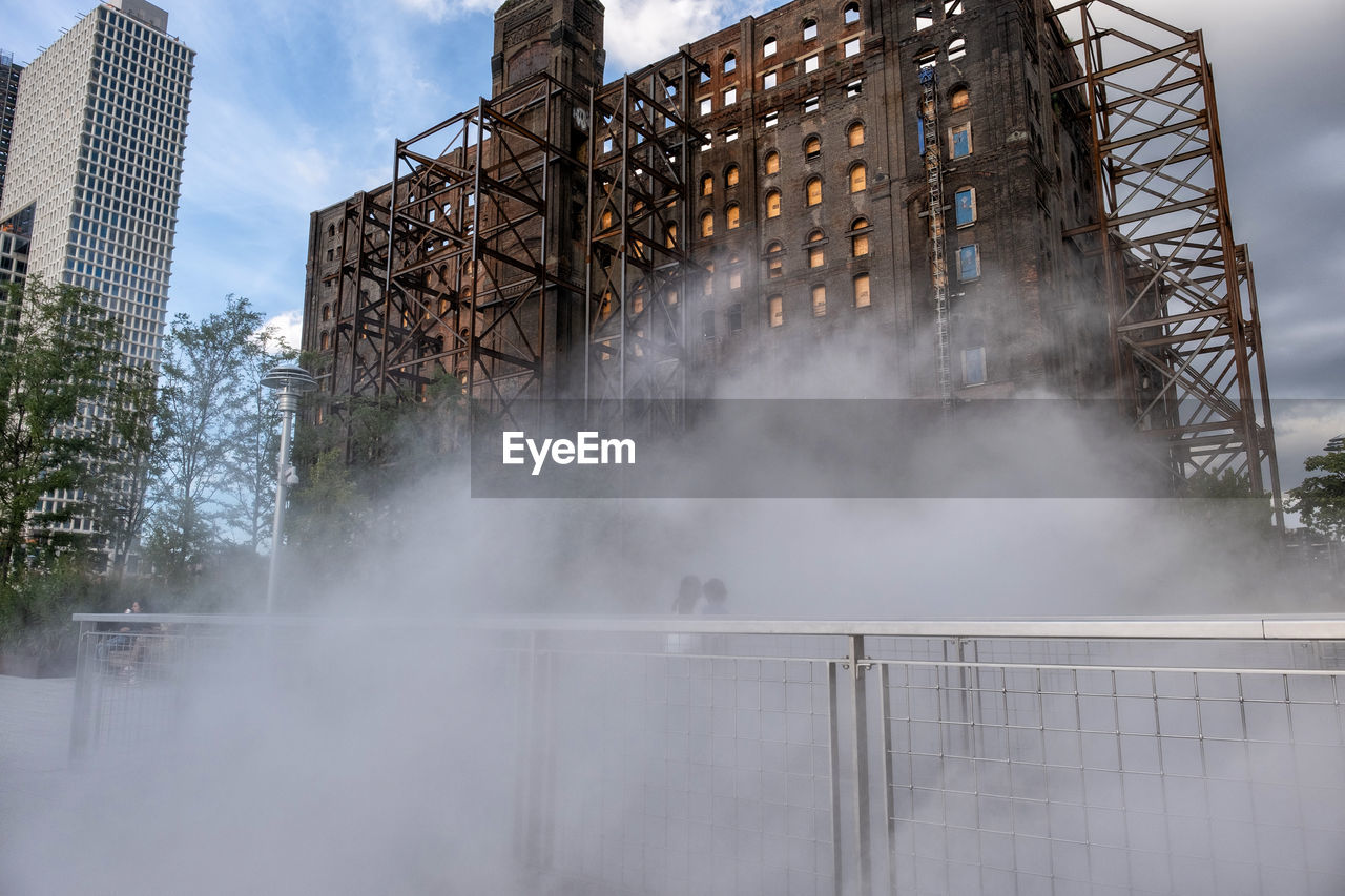 LOW ANGLE VIEW OF CONSTRUCTION SITE IN CITY