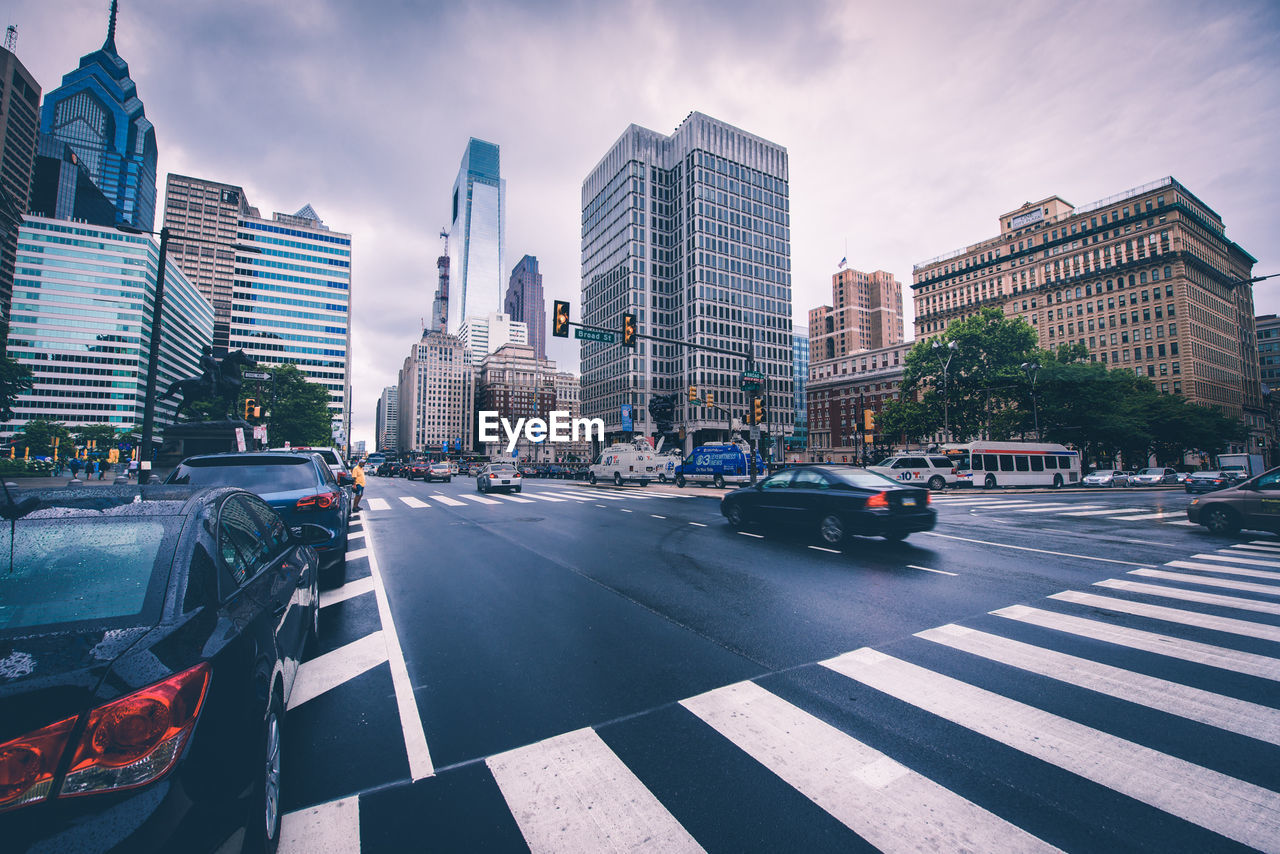 Cars on road in city