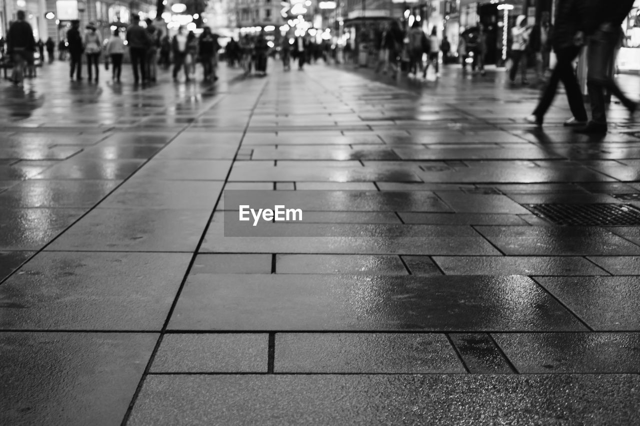 PEOPLE WALKING ON ZEBRA CROSSING