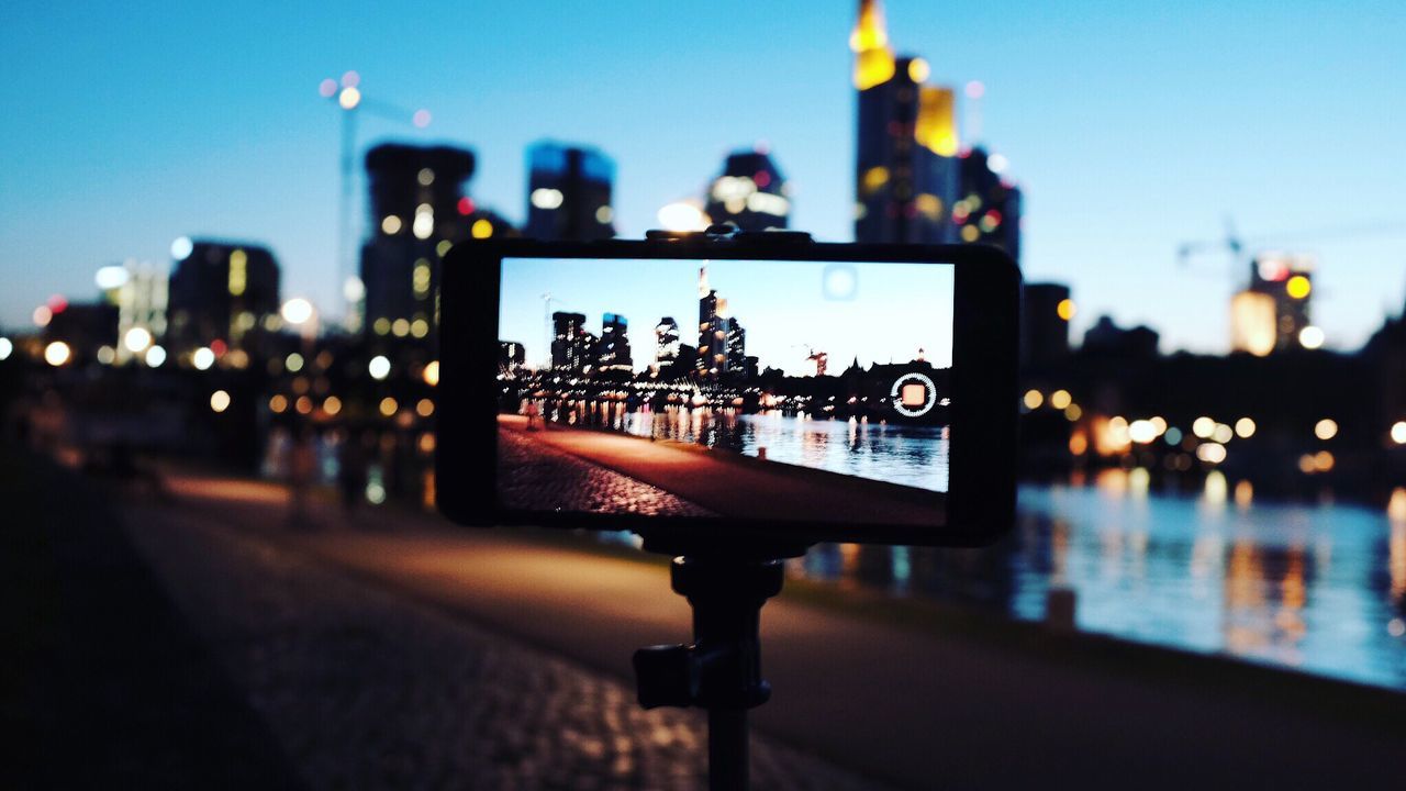 CLOSE-UP OF ILLUMINATED CITYSCAPE