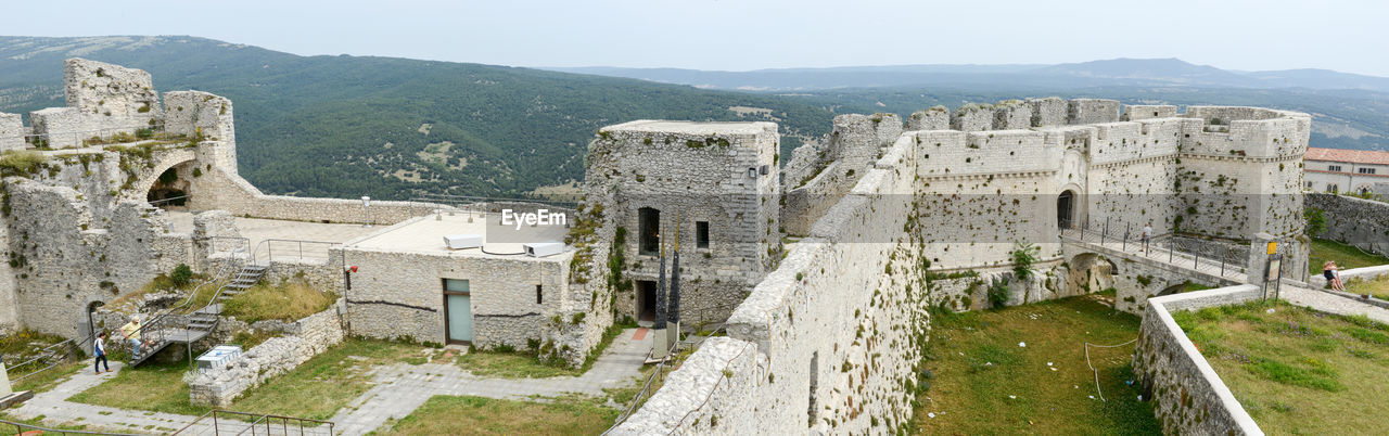 low angle view of old ruins against sky