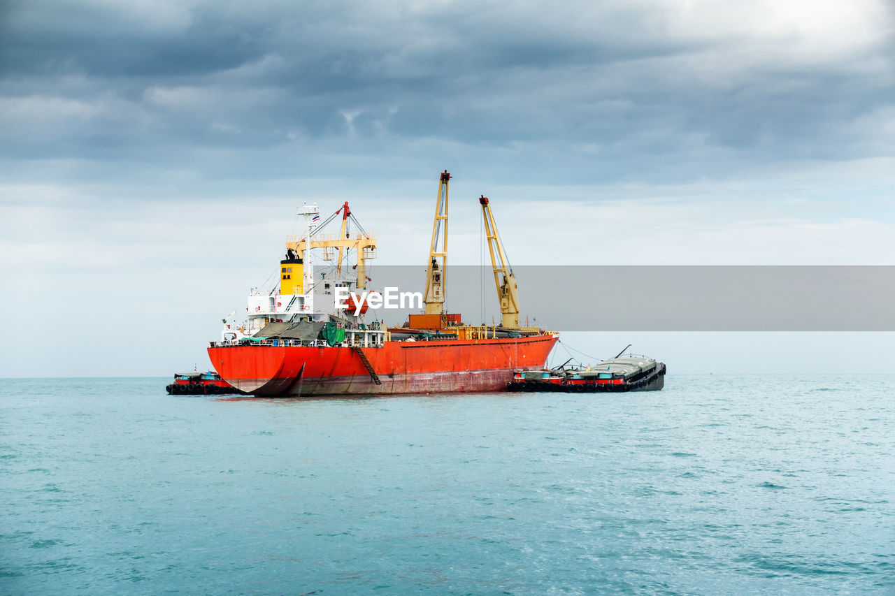 Ship in sea against sky