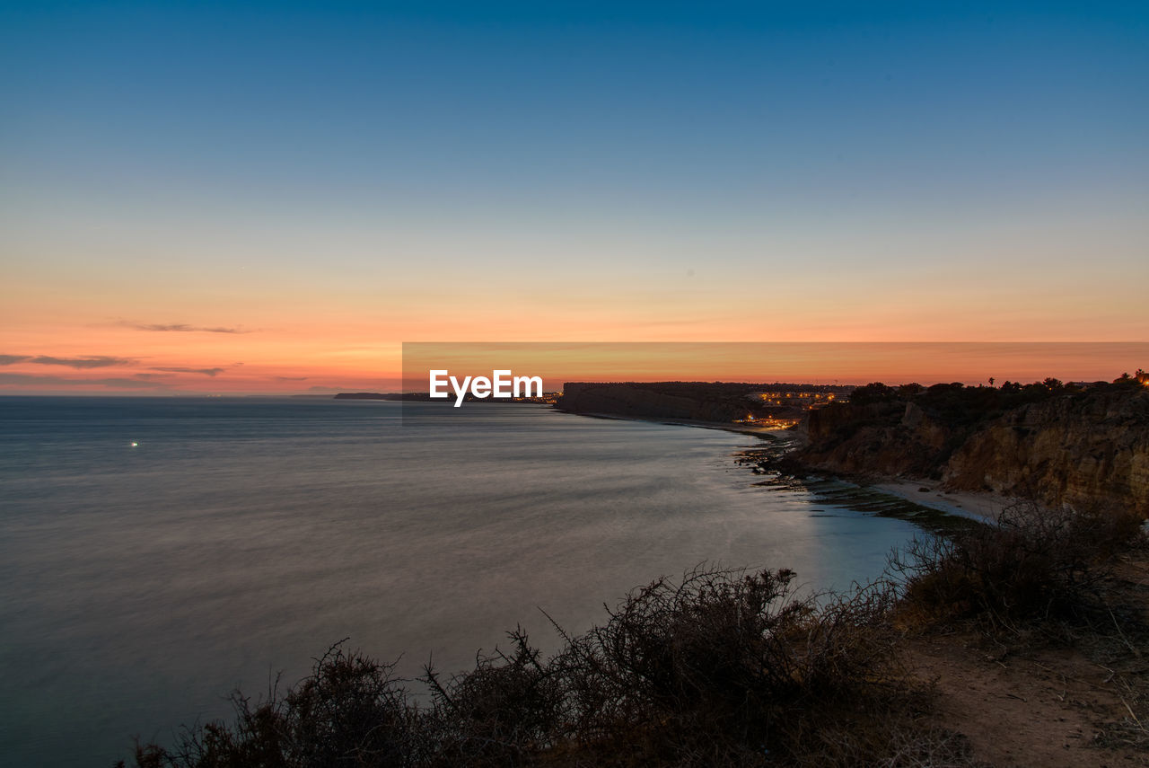 Scenic view of sea during sunset