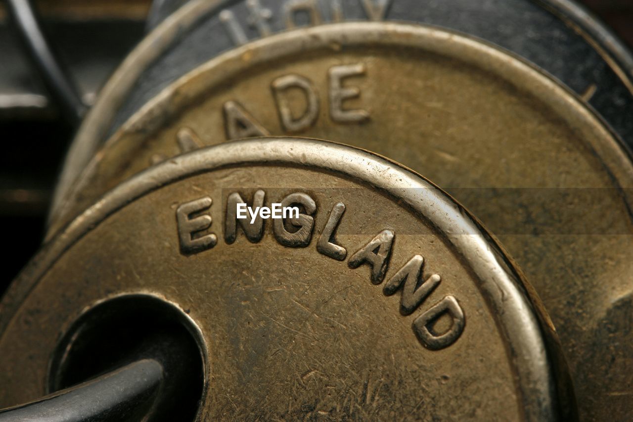 Close-up of coins written on england