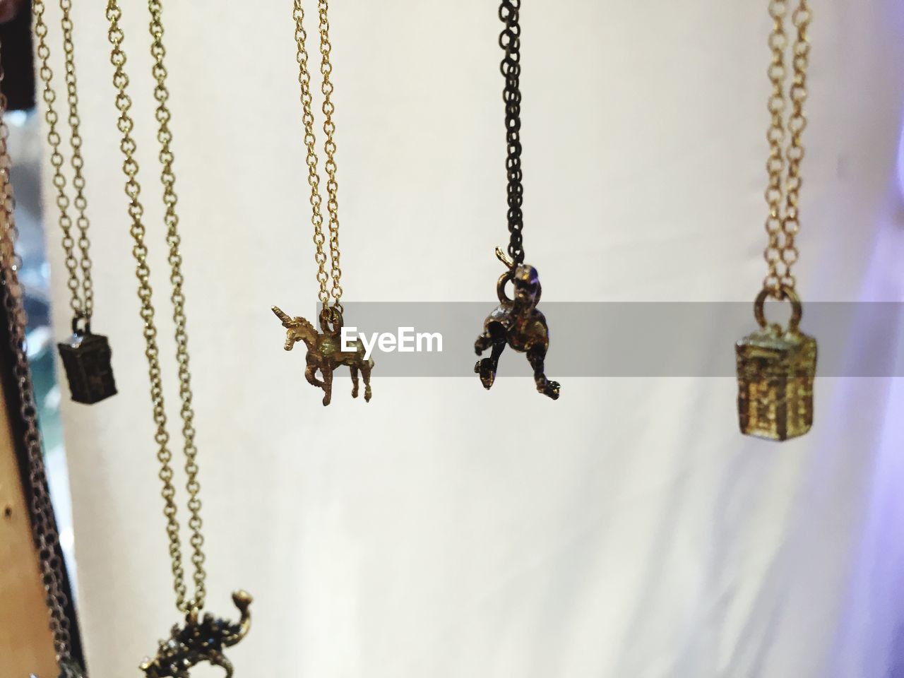 Close-up of various necklaces