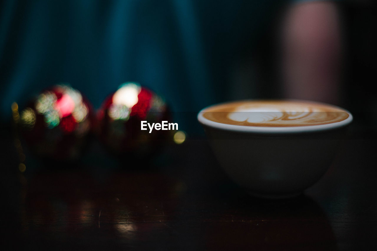 Close-up of cappuccino on table