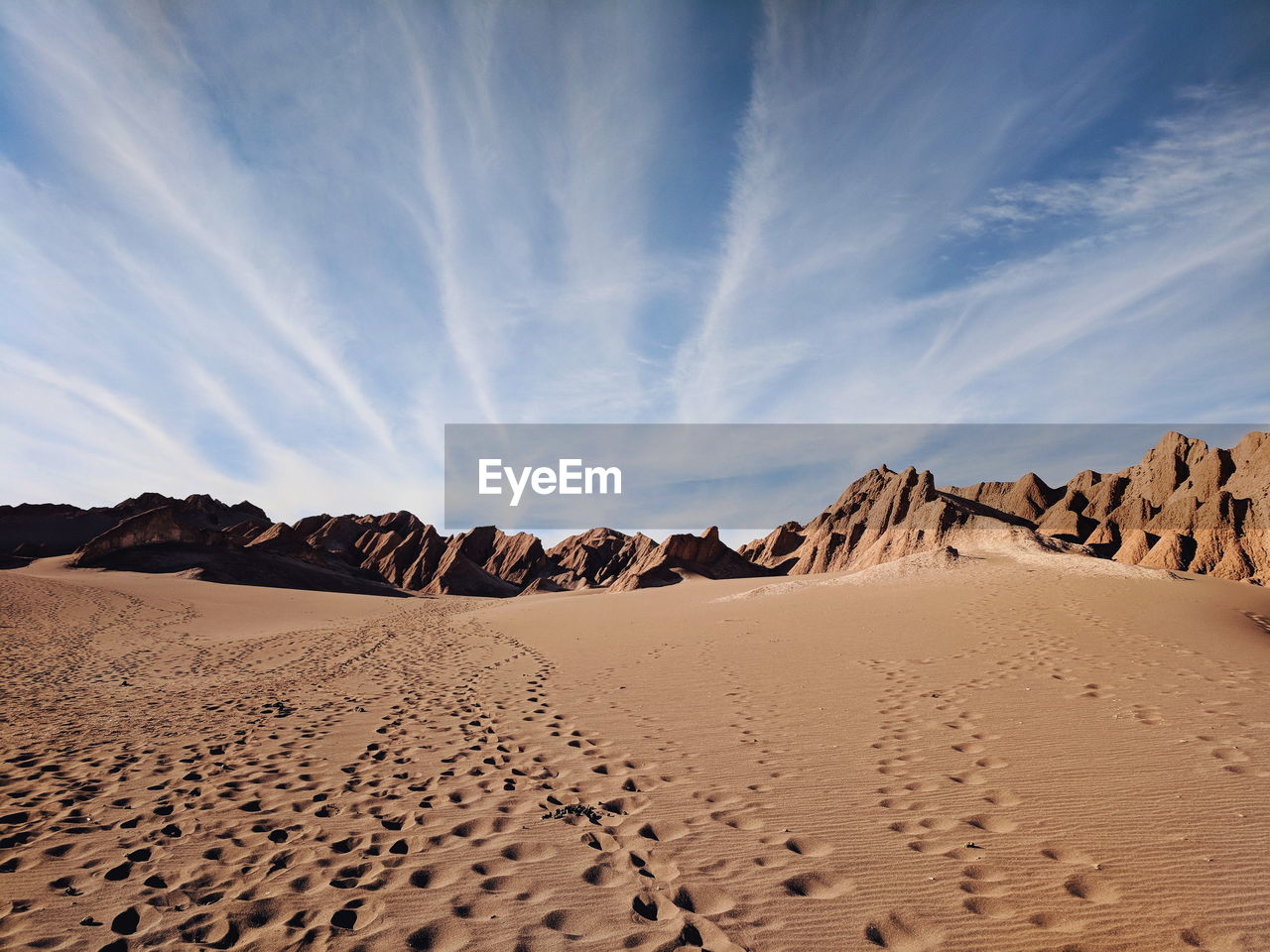 Scenic view of desert against sky