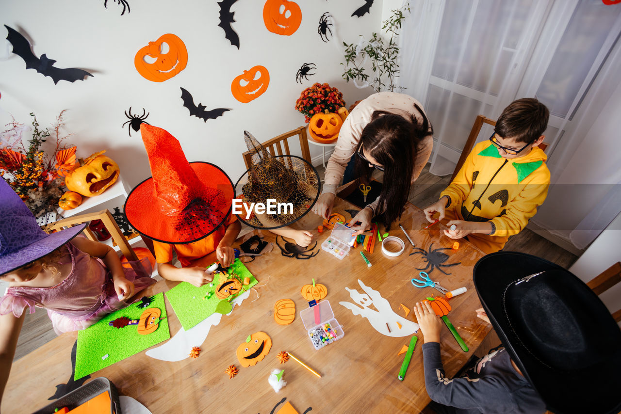 High angle view of people on table