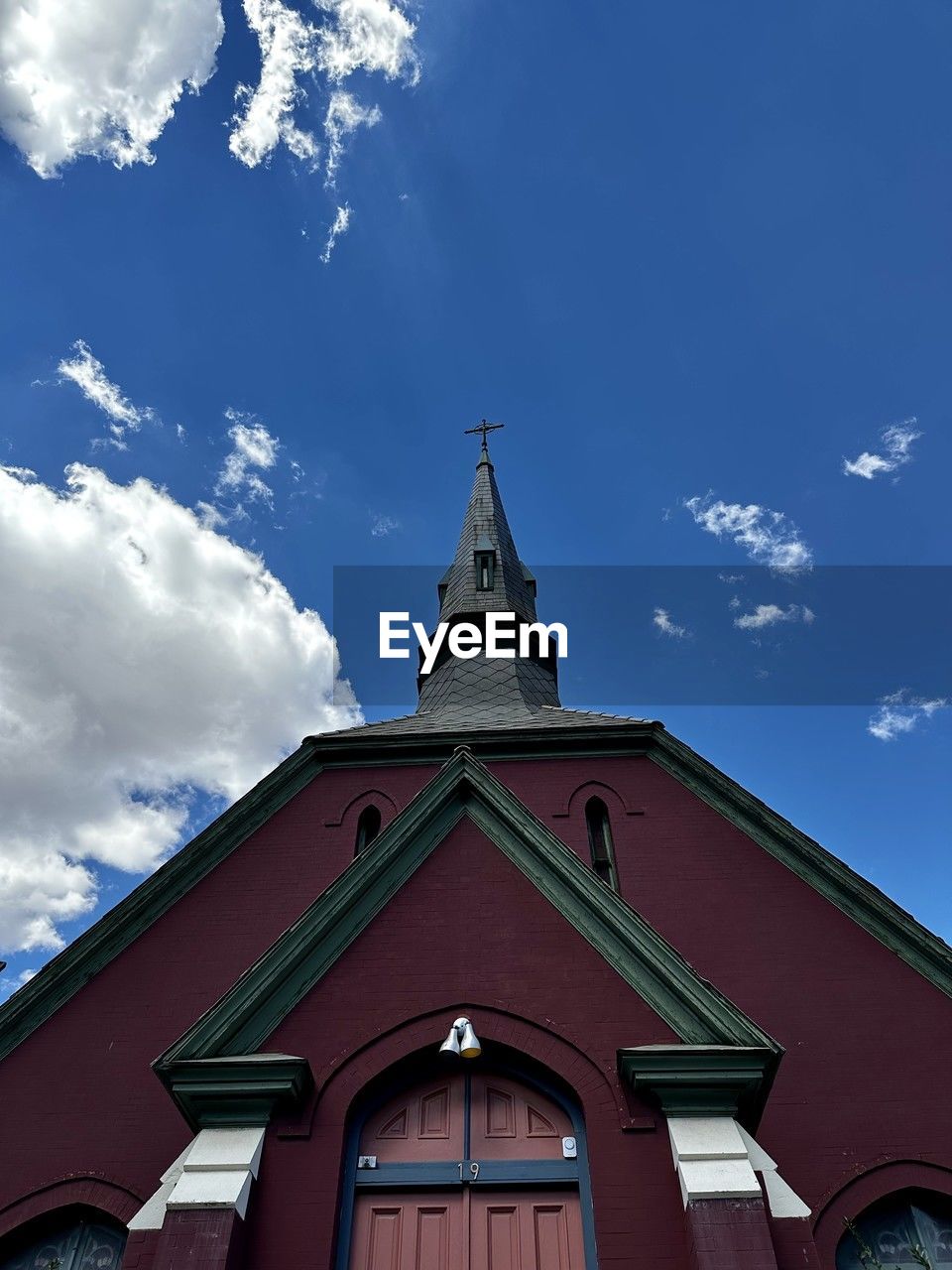 architecture, sky, building exterior, built structure, cloud, building, religion, place of worship, belief, nature, low angle view, blue, spirituality, tower, no people, travel destinations, steeple, landmark, the past, history, outdoors, city, day, cross, travel