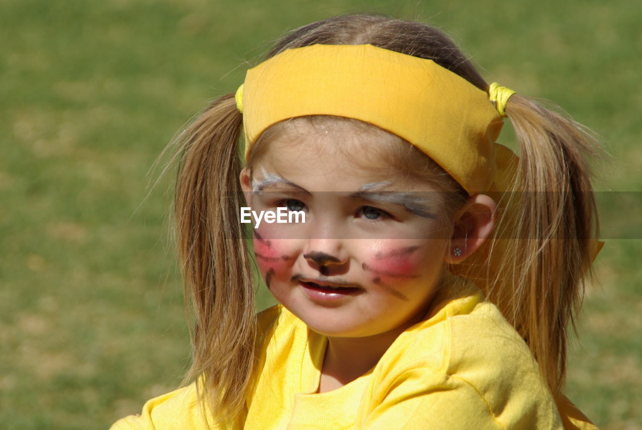 PORTRAIT OF GIRL WITH YELLOW EYES