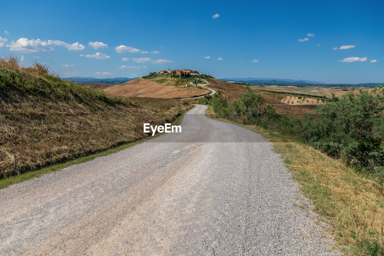 View of the road leading to mucigliani village - small place located at siena province