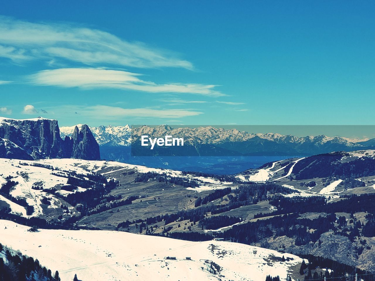 snow, mountain, winter, cold temperature, scenics - nature, beauty in nature, sky, environment, landscape, mountain range, nature, snowcapped mountain, tranquil scene, tranquility, cloud, travel destinations, travel, no people, non-urban scene, blue, day, outdoors, land, tourism, sunlight, idyllic, ridge, white, mountain peak, winter sports, pinaceae, sports