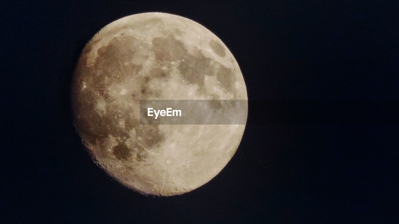 Moon in dark sky