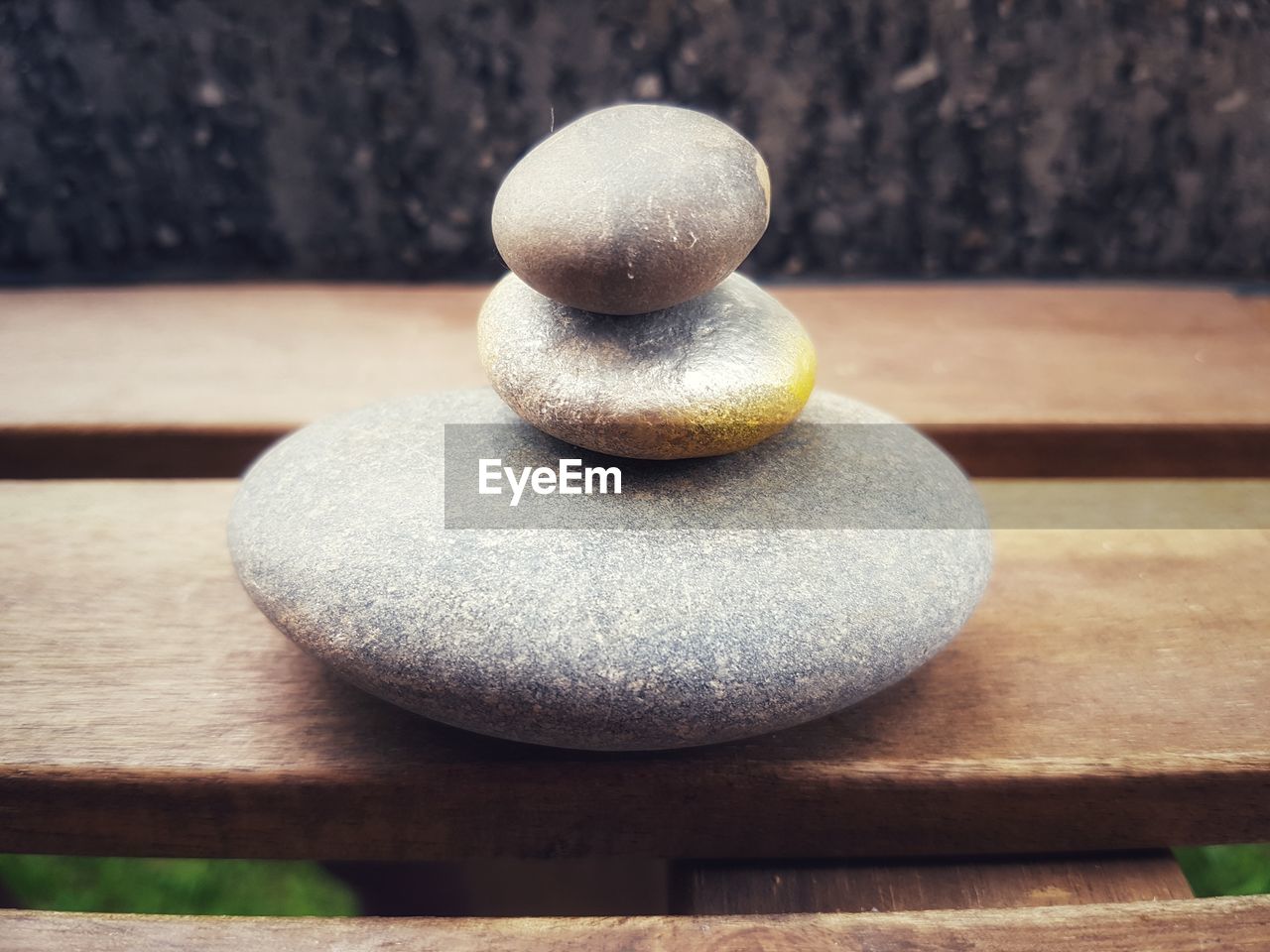 Close-up of stone stack on rock, zen concept 