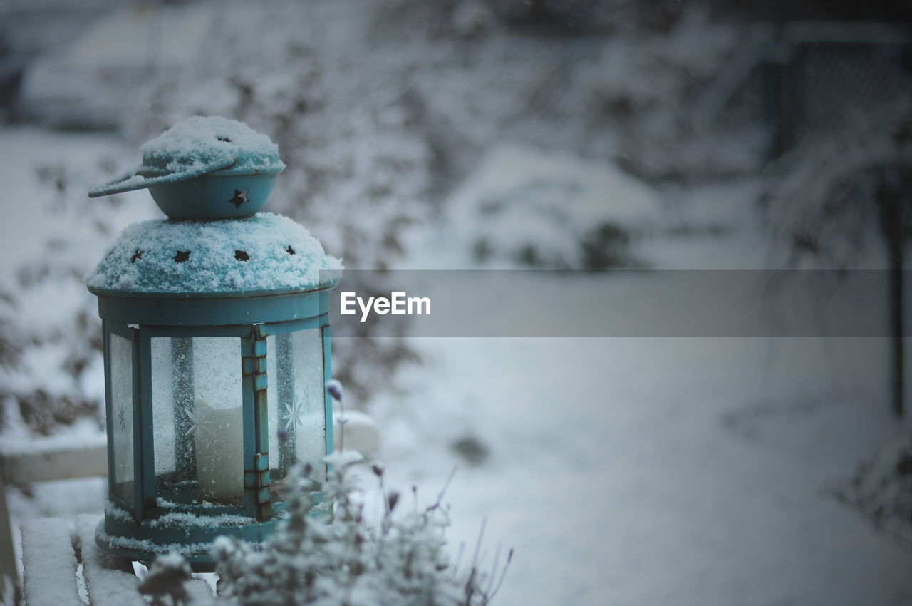 Close-up of lamp in snow