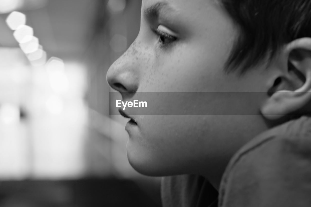 Close-up of boy looking away