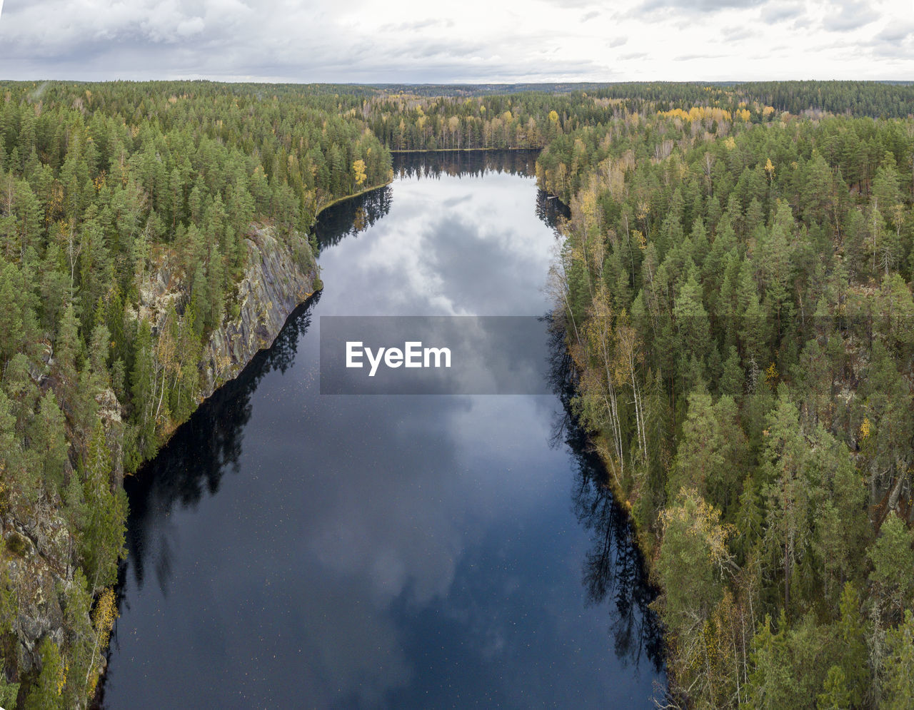 Scenic view of lake against sky, a forest lake in finland