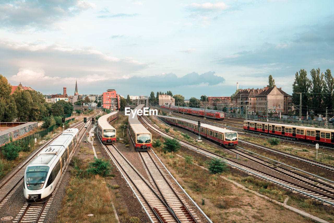 High angle view of train in city against sky