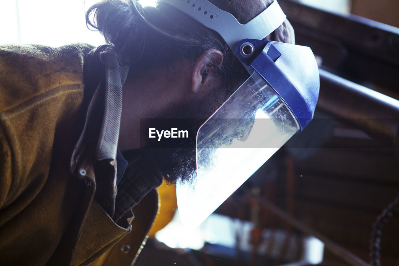 High angle view of worker working in factory