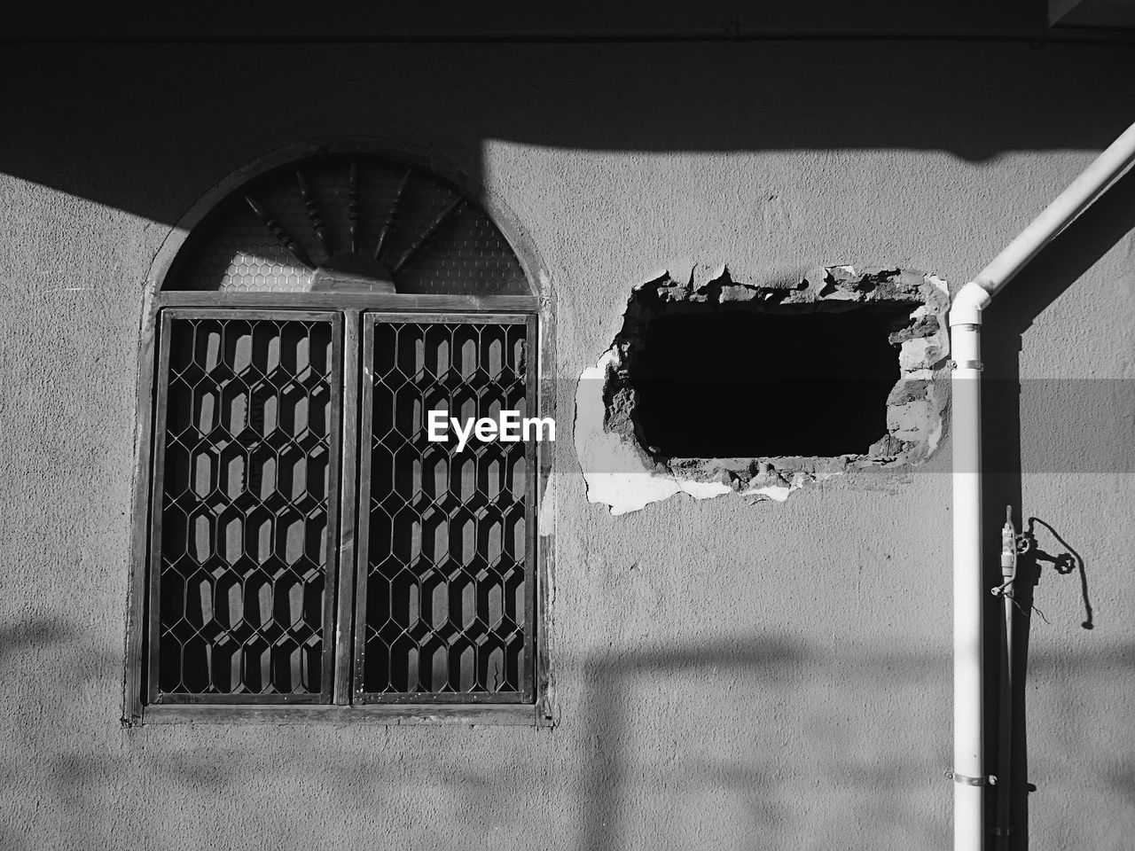 OPEN WINDOW ON OLD BUILDING