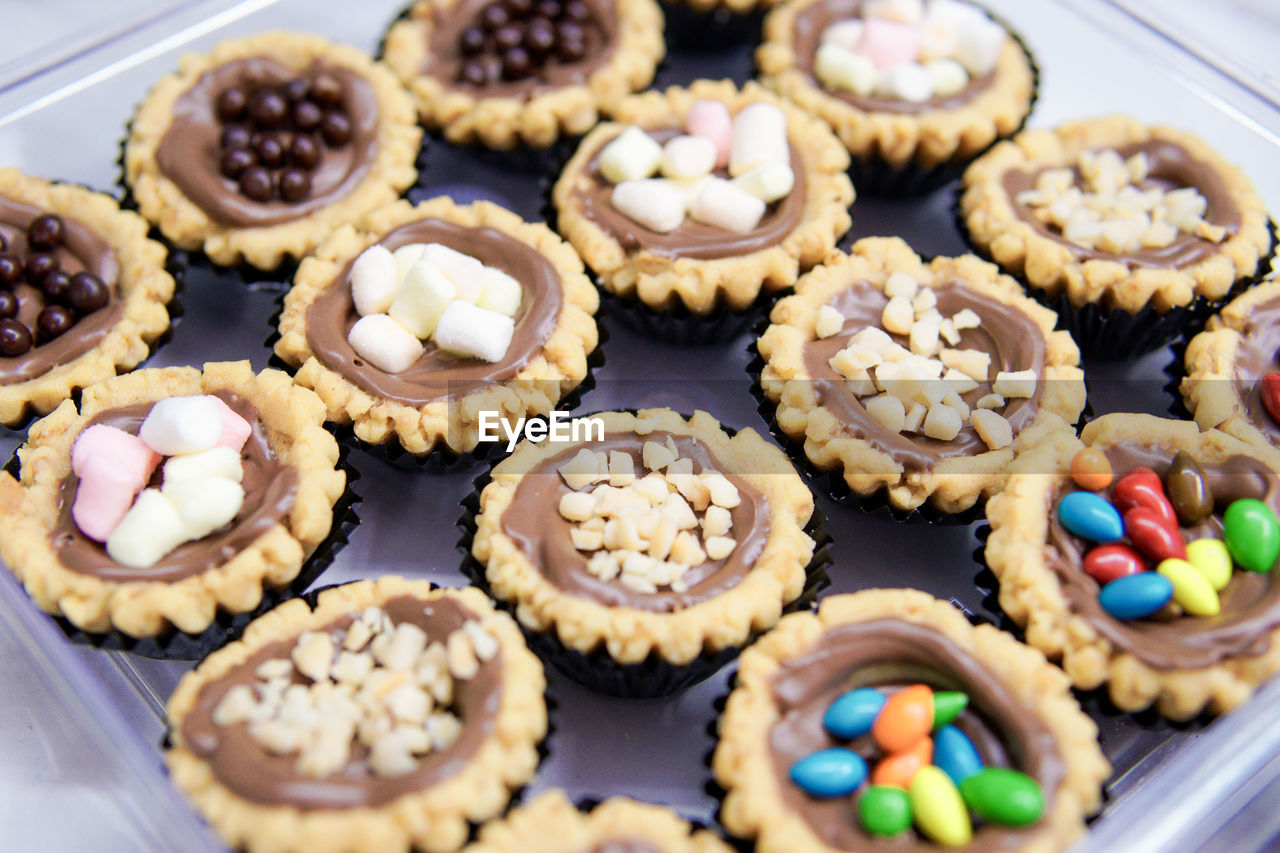Cheese tart, chocolate tart, and various types of tarts are served to be eaten on eid.