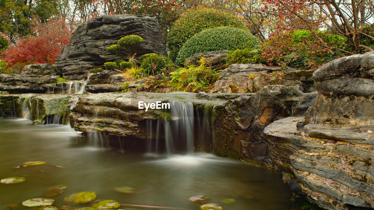 SCENIC VIEW OF WATERFALL