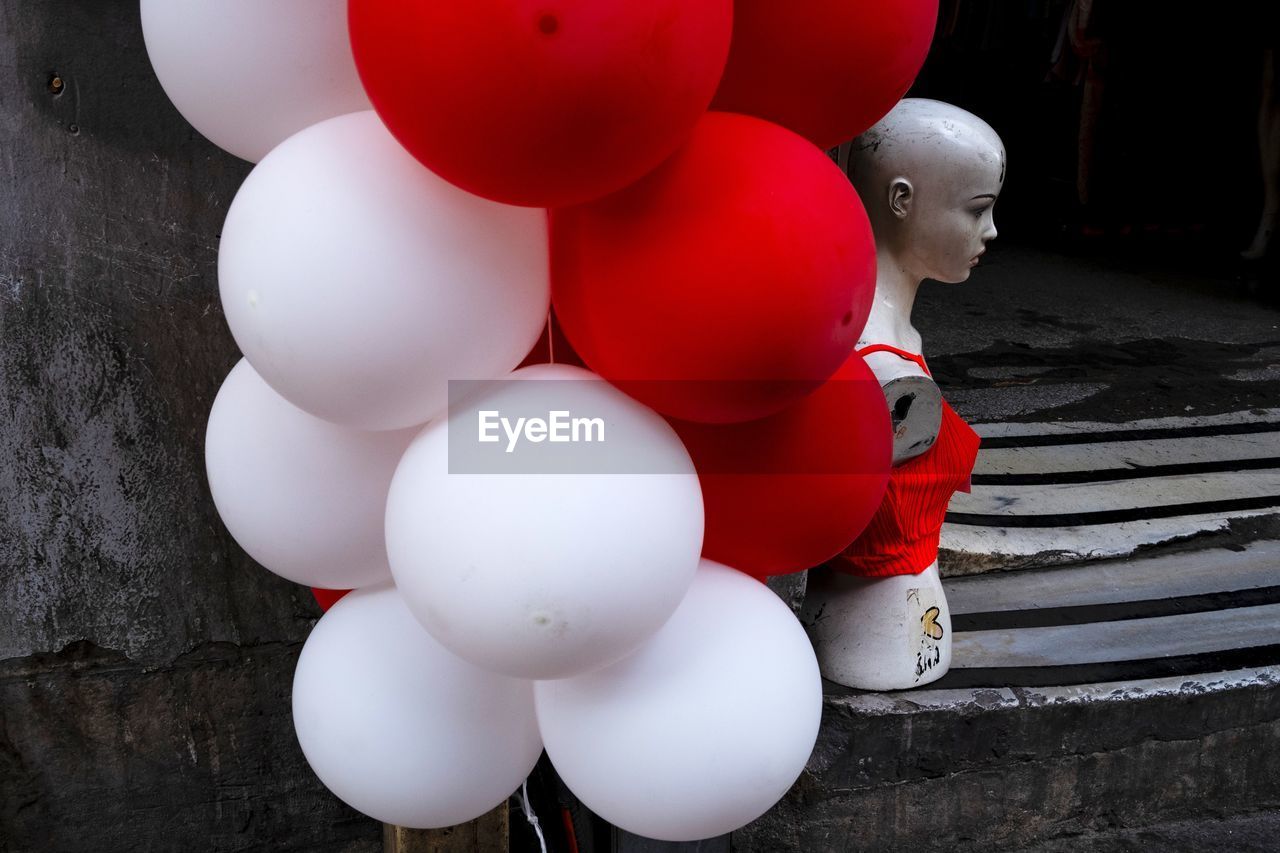 HIGH ANGLE VIEW OF BALLOONS TOY ON FLOOR