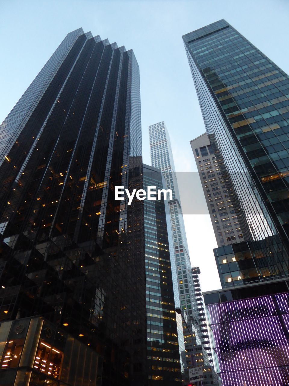 Low angle view of modern buildings against sky