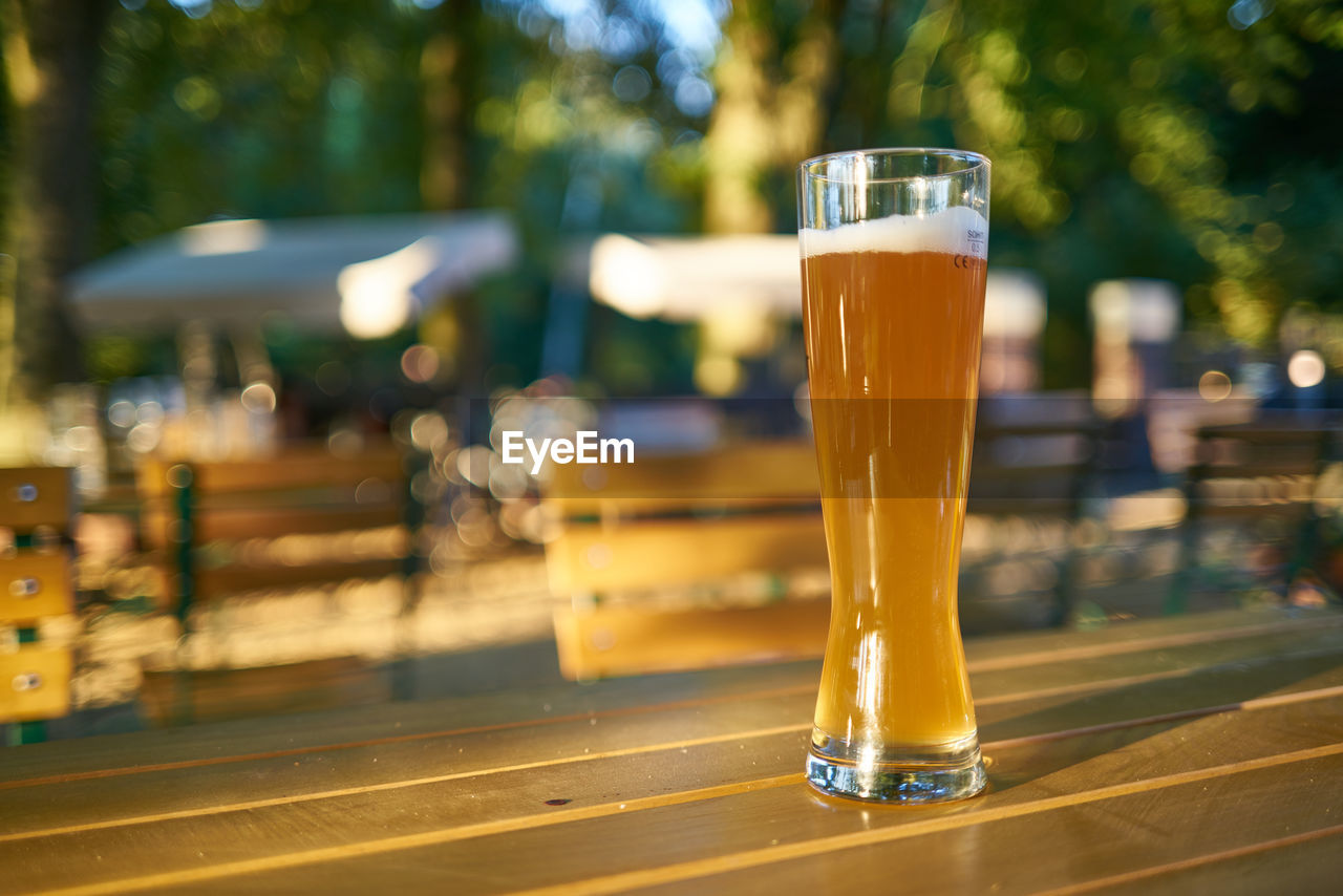 Close-up of beer glass on table