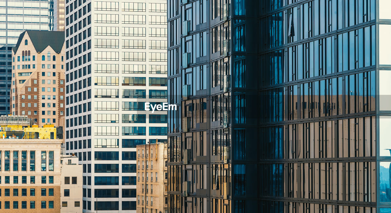 Low angle view of modern buildings in city