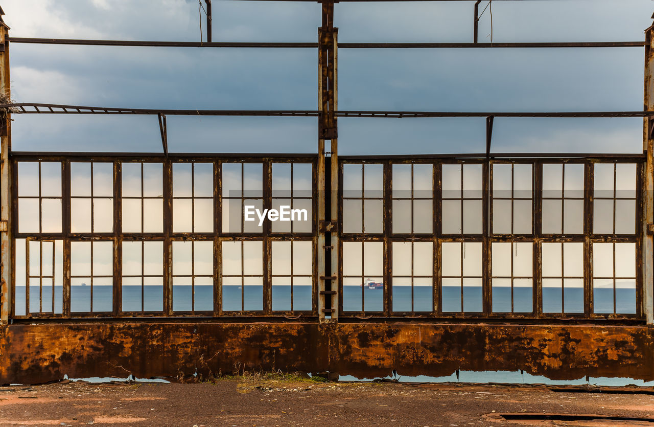 Building seen through glass window