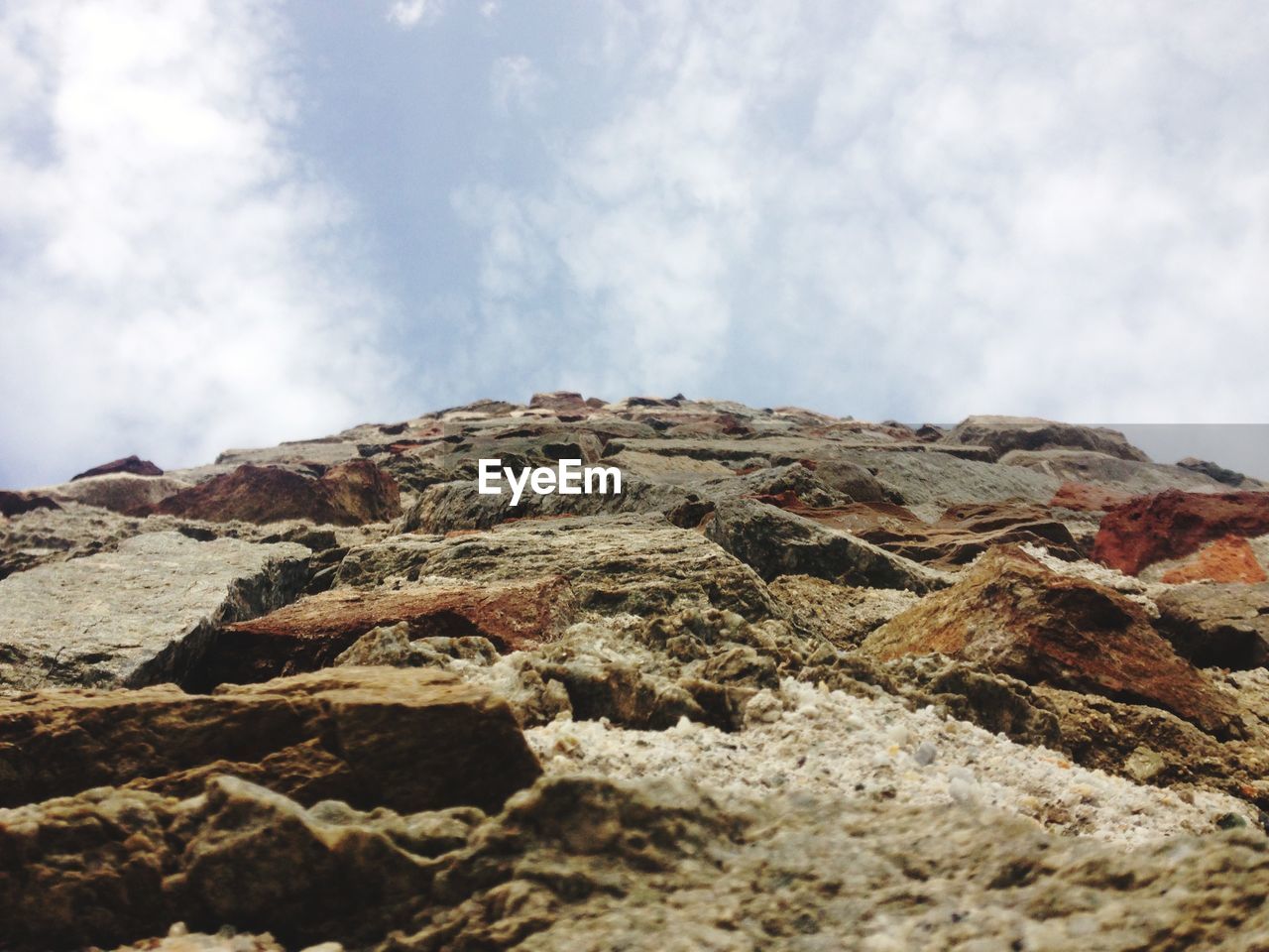 LOW ANGLE VIEW OF ROCKS AGAINST SKY