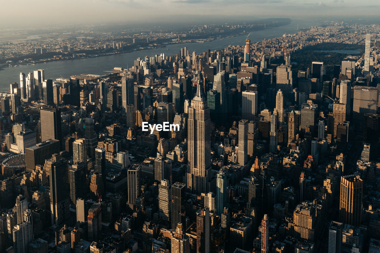 High angle view of modern buildings in city empire state building