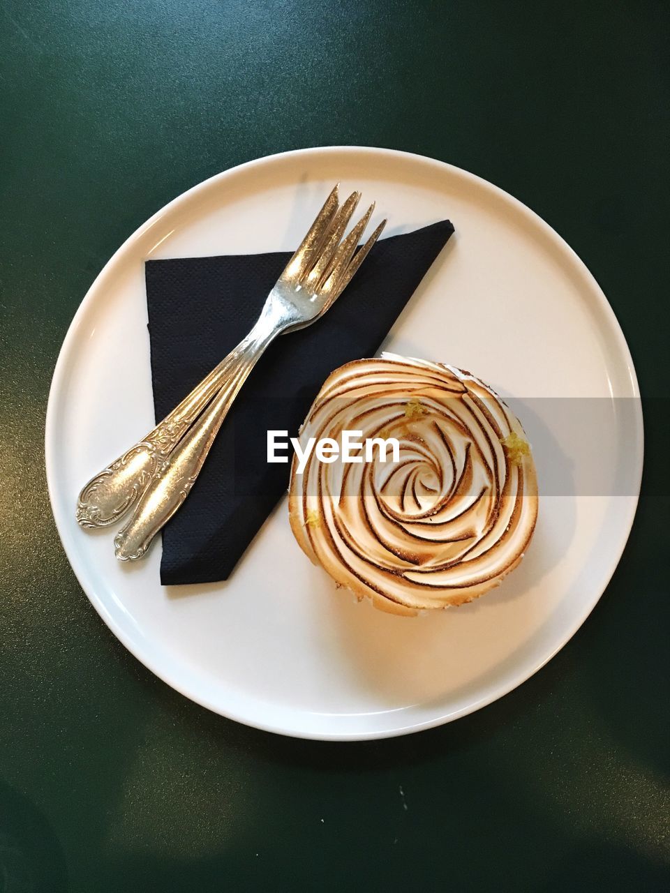 High angle view of cake served in plate on table